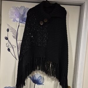 Elegant Black Knit Poncho with Fringe